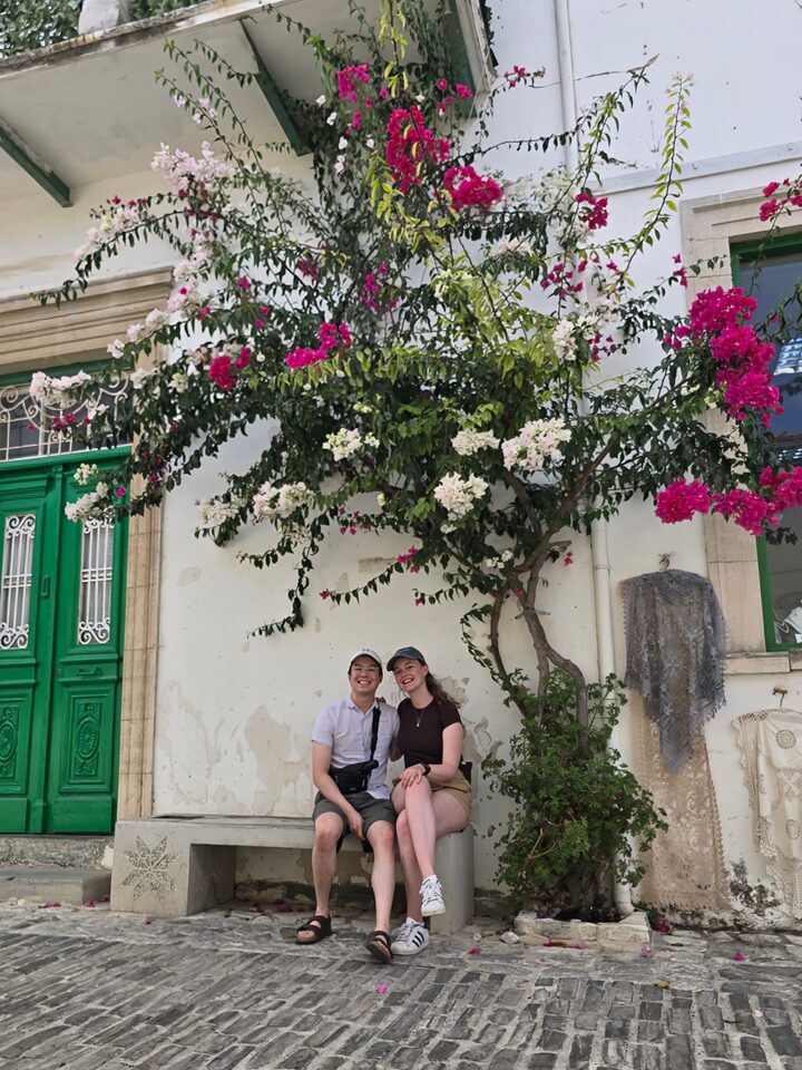Andrew and Becky posed on a bench.
